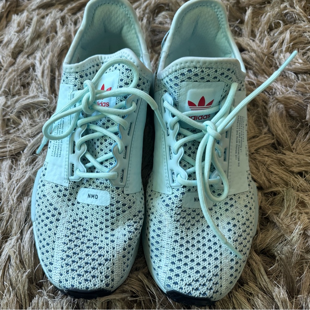 Adidas NMD ‘Almost Blue’ in gently worn condition